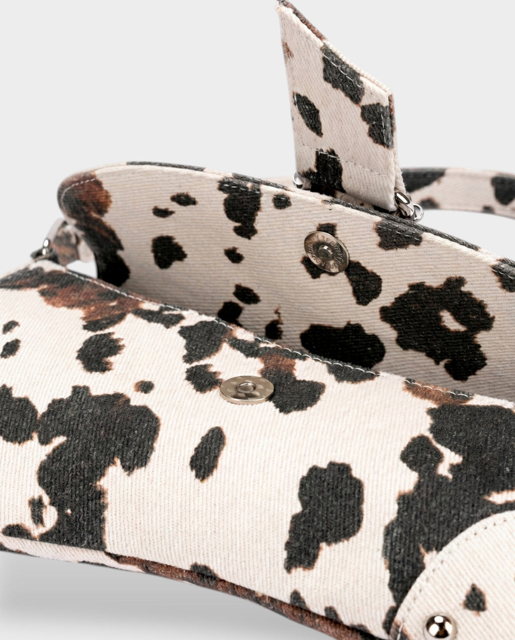 NELCY Cow Print Buckle Shoulder Handbag