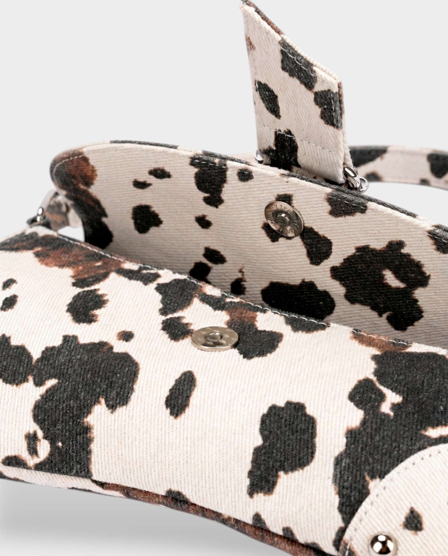 NELCY Cow Print Buckle Shoulder Handbag