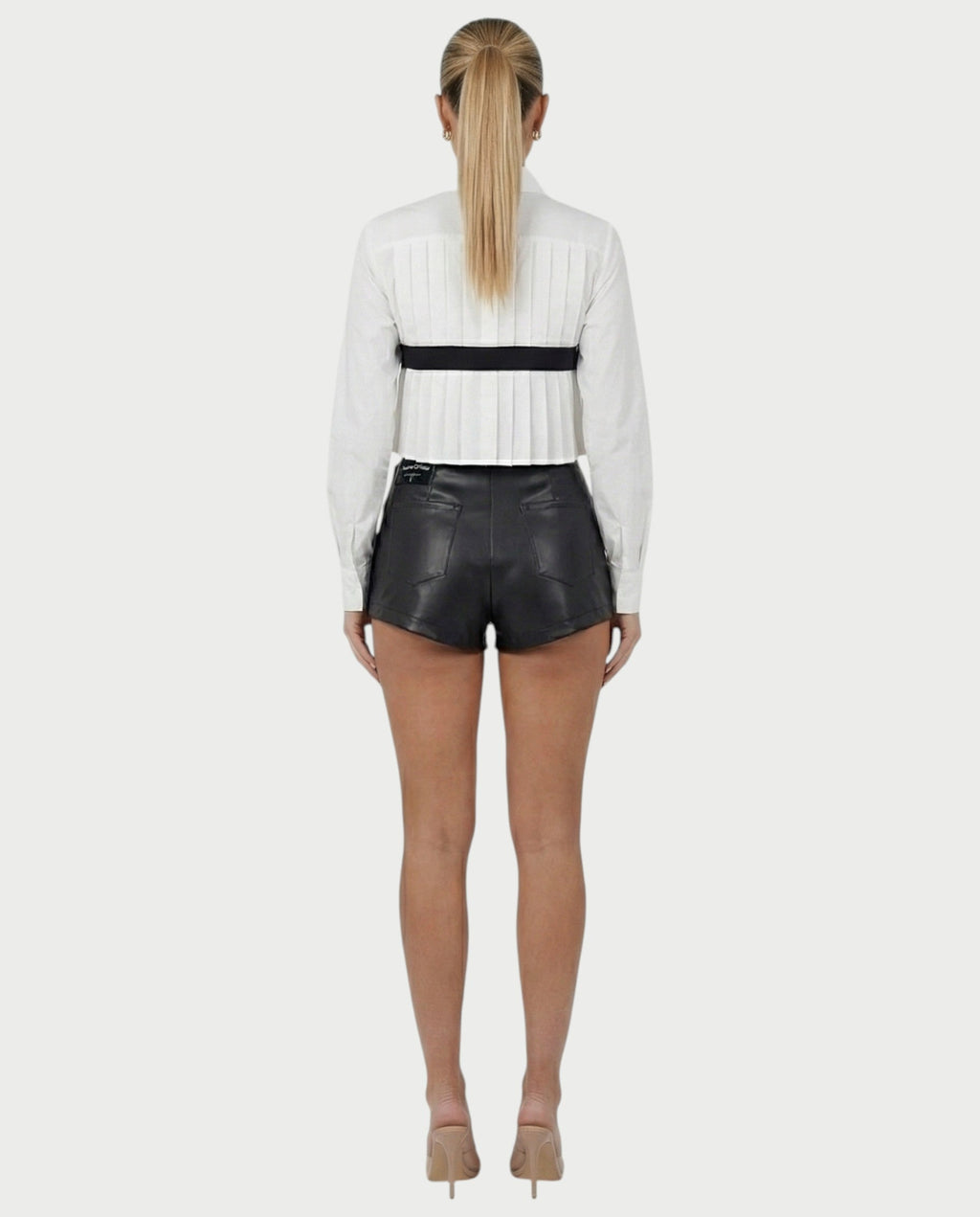 MAIRA High-Waisted Faux Leather Wrap Mini Skirt