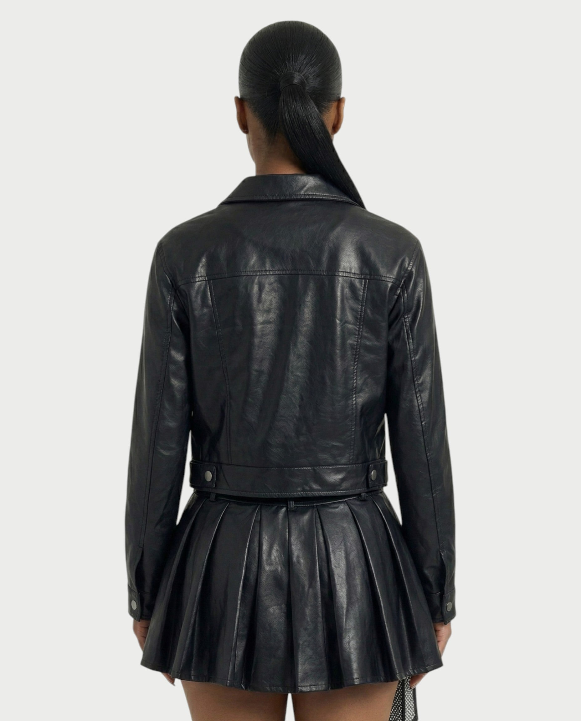 REVIA Faux Leather Jacket & Pleated Mini Skirt Set