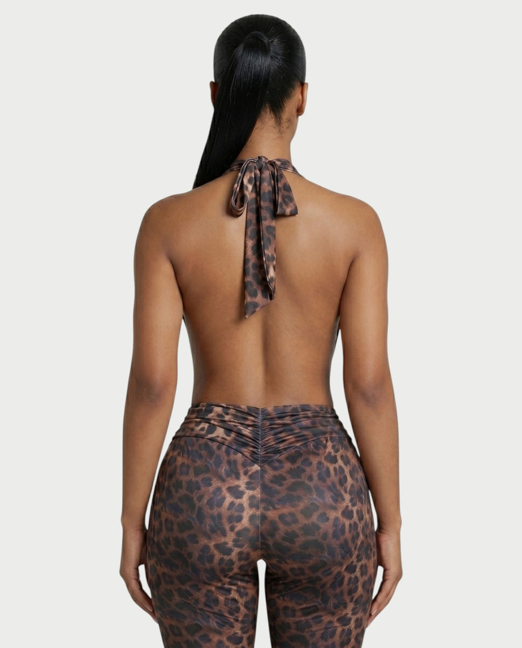 LERONA Leopard Plunging Halter Capri Romper